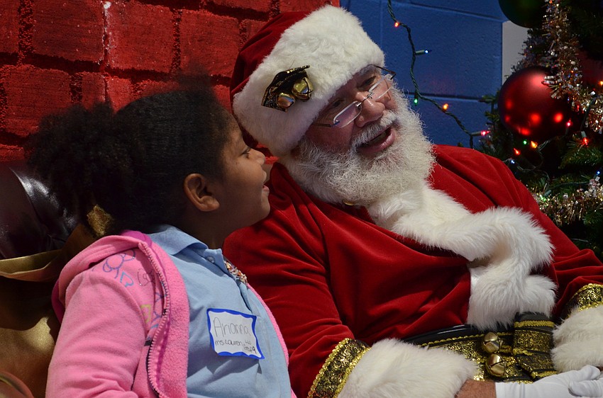 Arianna Allen pleads her case to Santa about why she should get a horse for Christmas.