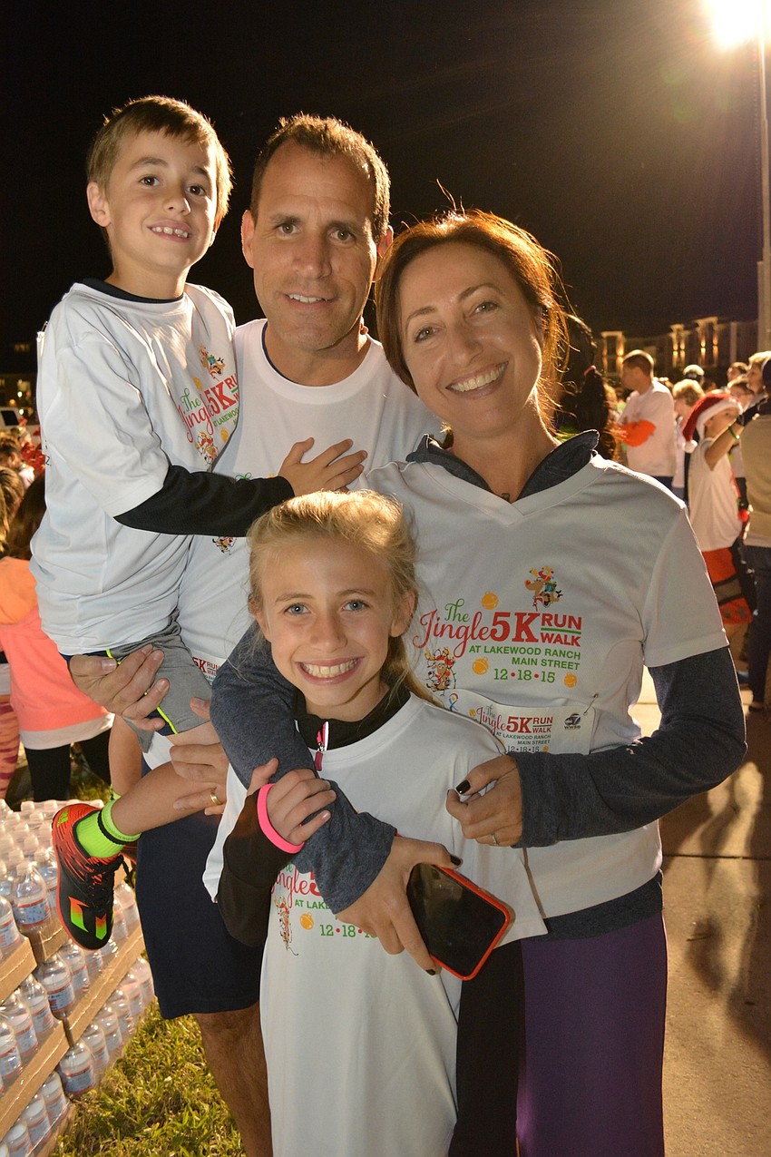 Parker, Kevin, Paige and Candice McElyea run as a family.