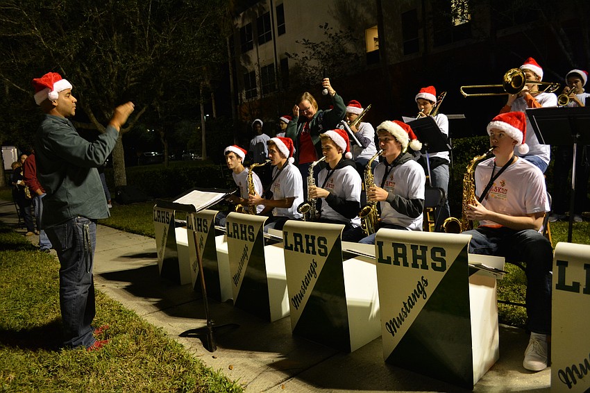 Lakewood Ranch High School band students play the national anthem.