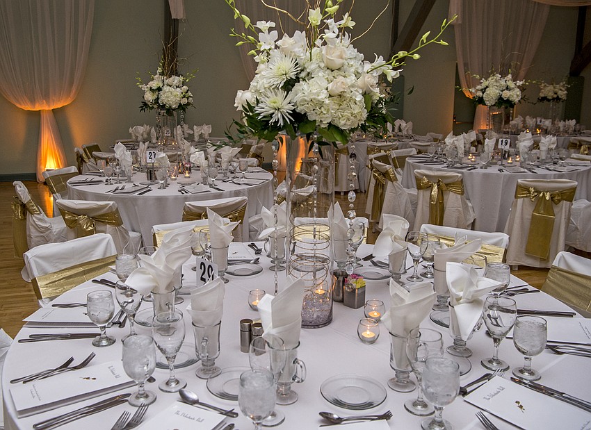 Catering and tables by Michael's On East, floral decor by Flowers By Fudgie