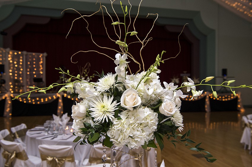Catering and tables by Michael's On East, floral decor by Flowers By Fudgie