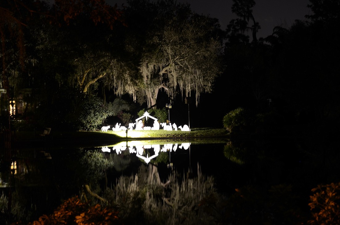 This nativity scene is a serene pond-side display at the corner of Clubhouse Drive and Pine Meadow Way.
