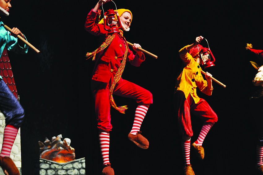 Alaina Kimsey, as Happy, and Abbey Walsh, as Sneezy, dance joyfully in the Russian School of Ballet’s performance of “Snow White and the Seven Dwarfs.”