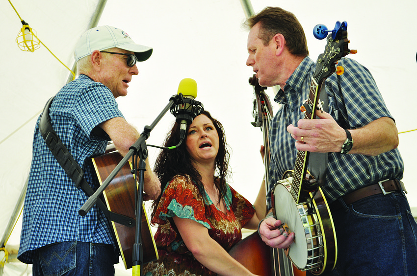Sonya Stratton and the Straight South performs, including Doug Row on lead guitar, Sonya Stratton on bass and Jeff Folger on the banjo at Linger Lodge Restaurant’s Bluegrass Festival and Gumbo Cook-off.