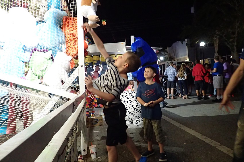 (left to right) Mason and Vaughn Vicker shoot hoops.