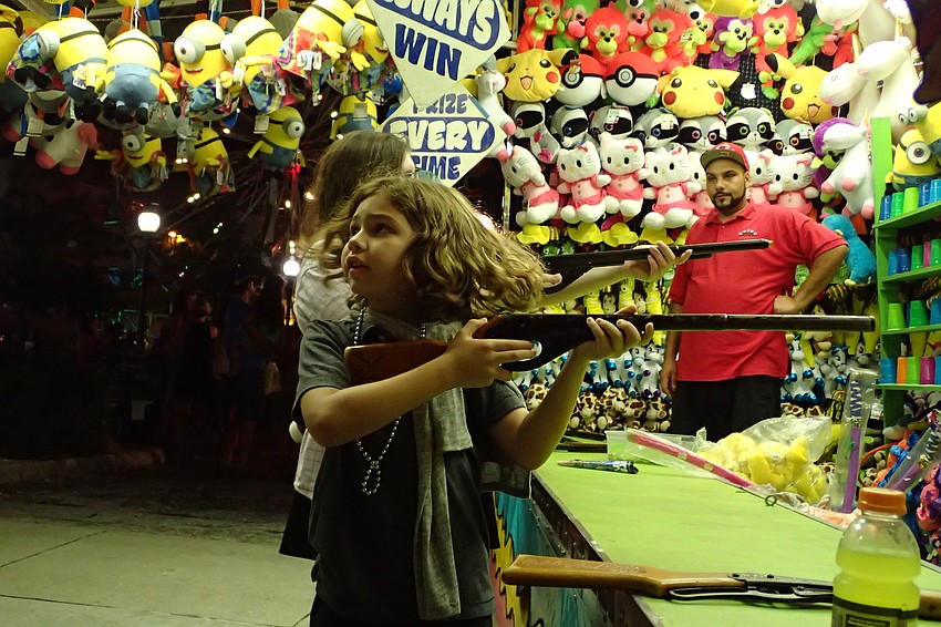 Maximo Santander at the pop gun booth