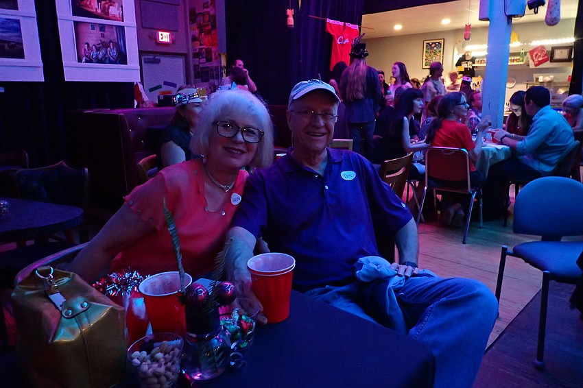 Tom Walker (r) and Doreen Dupont (l) enjoy the music and food at Fogartyville.