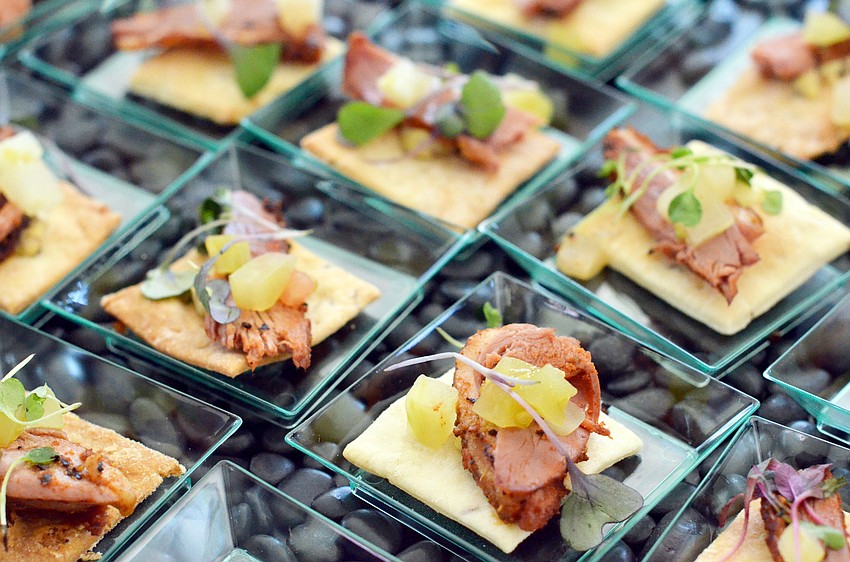 Duck pastrami with horseradish mustard and pickled green tomatoes from Sophie’s at Saks