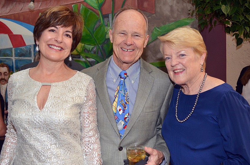 Cathy Layton with Bob and Carolyn Johnson