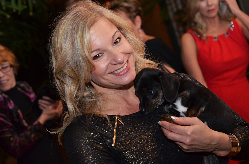 Dayle Hoffman with Tammy, a Jack Russell mix at ARC’s Unconditional Love Gala