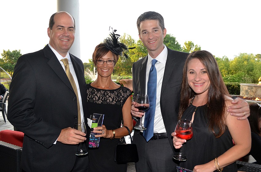 Rich and Jami McCormick with Mike and Carol Woolery
