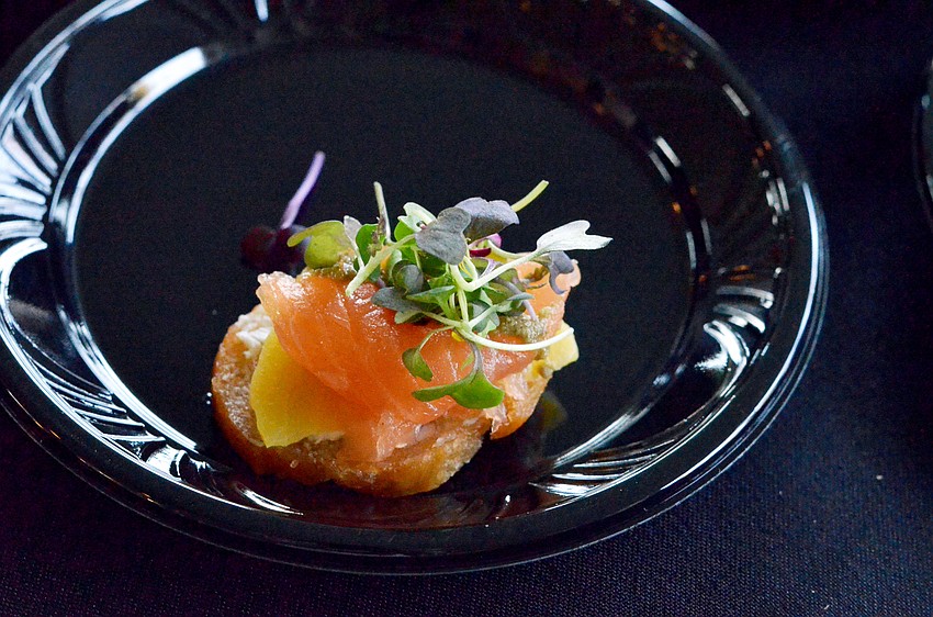 House-cured salmon, yellow beets, goat cheese and caper oil crostinis from Michael’s On East