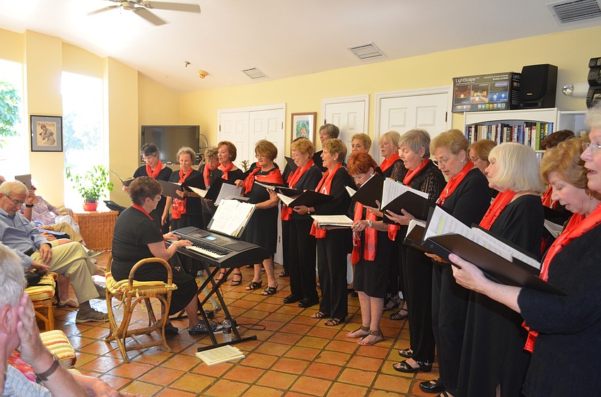 The choir performs a variety of Broadway and movie songs.