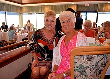 Theresa Boley and Mercedes Samuels sport sun dresses at the event.