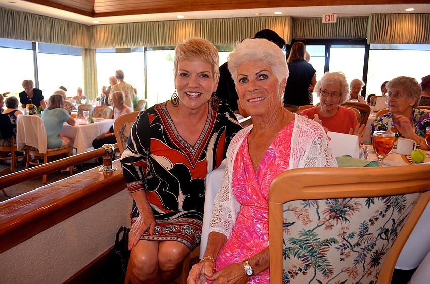 Theresa Boley and Mercedes Samuels sport sun dresses at the event.