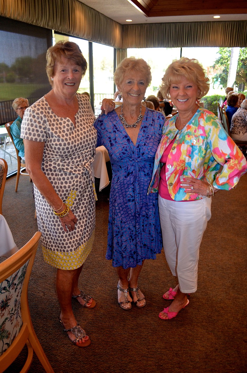 Jean Cooke, Jackie Miller and Toni Bookout are ready for spring in their bright outfits.