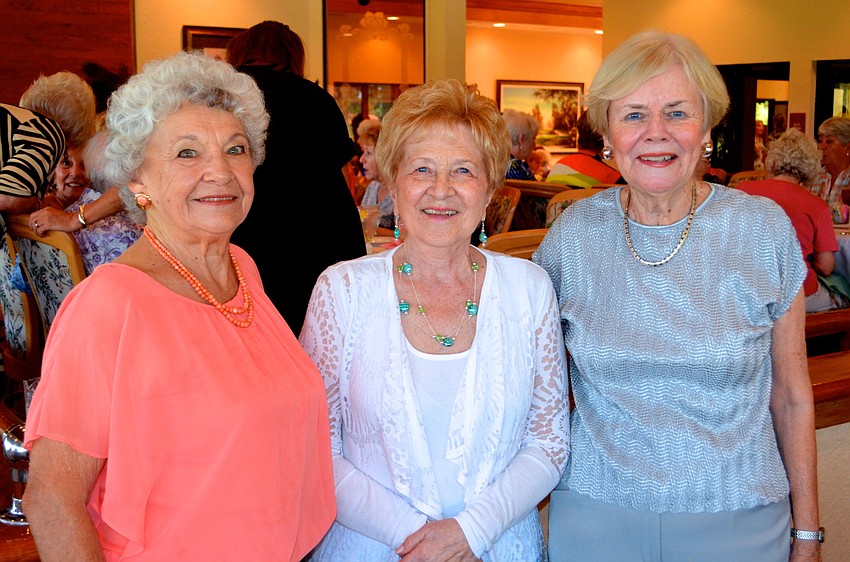 Barbara Van Buren, Joan Ackerman and Brenda Leonard show off matching smiles in the dining room.