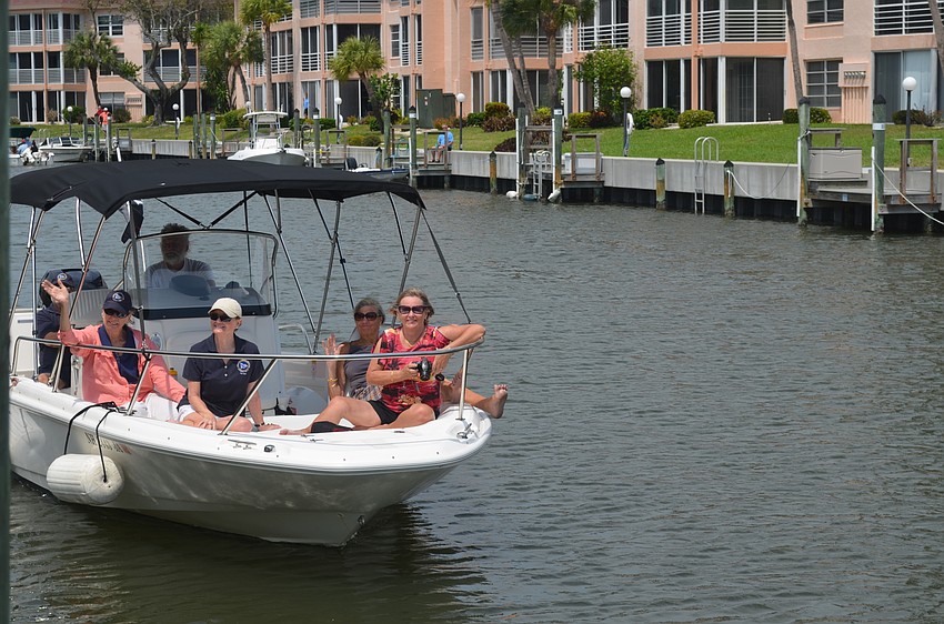 ohn and Maureen Shea prepare to have their boat blessed.