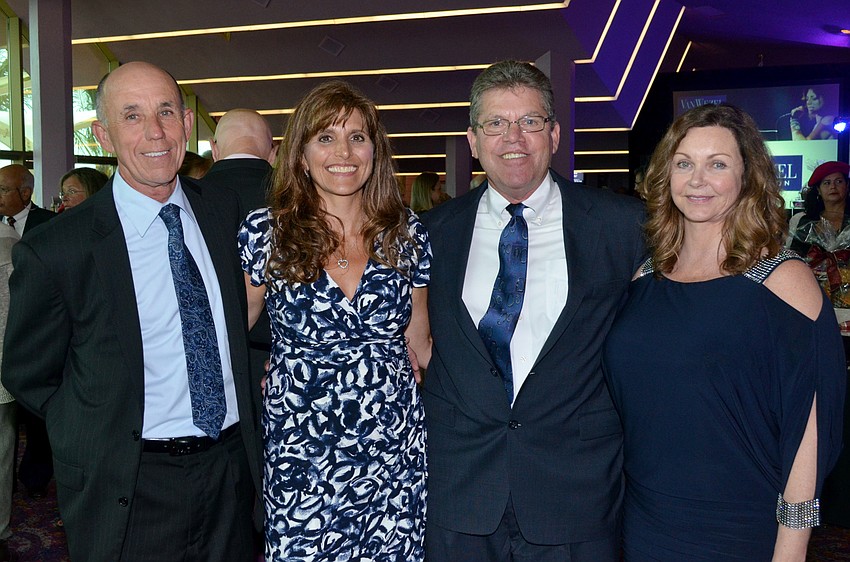 Jim Mulligan and Theresa Story with Bob and Karen Smith