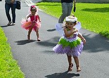 Abbi Peters and Alexa Freck flutter down the path at Historic Spanish Point for the Fairy House Festival.