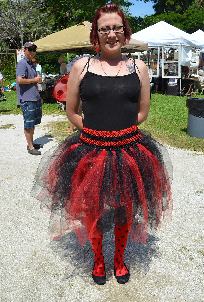 Kira Miller dressed as the Fairy of the Ladybugs.