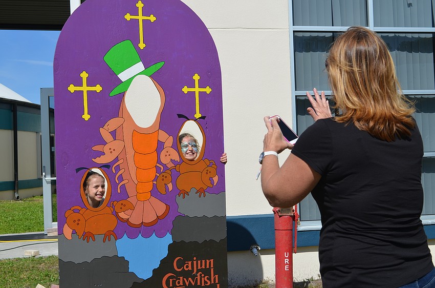 Lisa Graczyk snaps a photograph of Josie Maloney and her daughter Joanna.