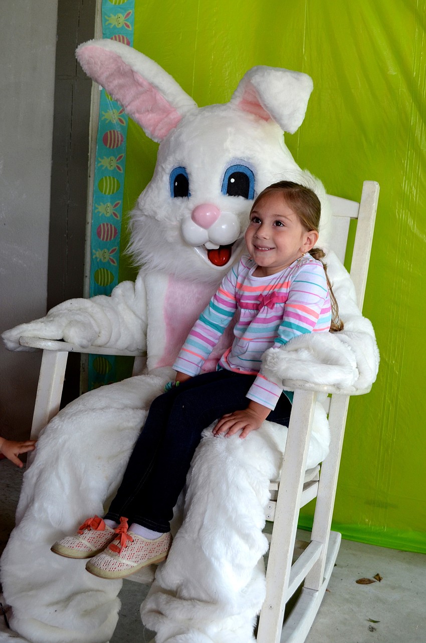 Although her younger sister, Grace, was scared to sit with the Easter Bunny, Alexis Hoot said cheese with the holiday mascot.