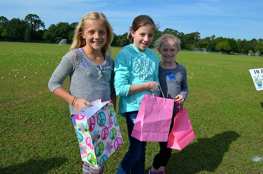 Lily Pierson, Kylie Clark and Kelsey Lee enjoy hunting for candy-filled eggs every Easter.