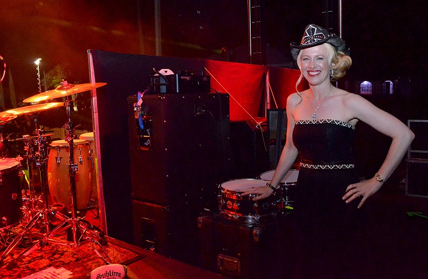 Firefly Gala Chairwoman Ariane Dart on stage before the Bret Michaels concert