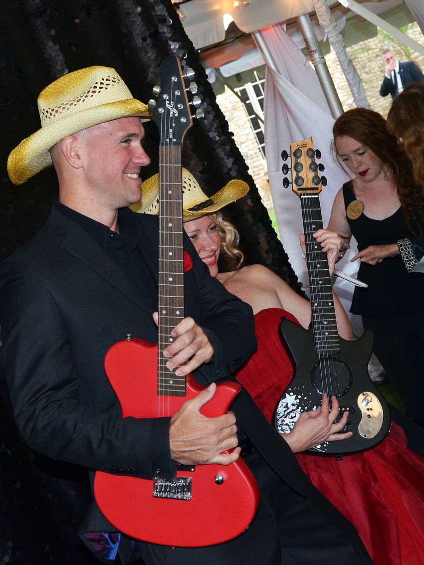 Guests dress up like rock stars in the Hello Gorgeous photo booth