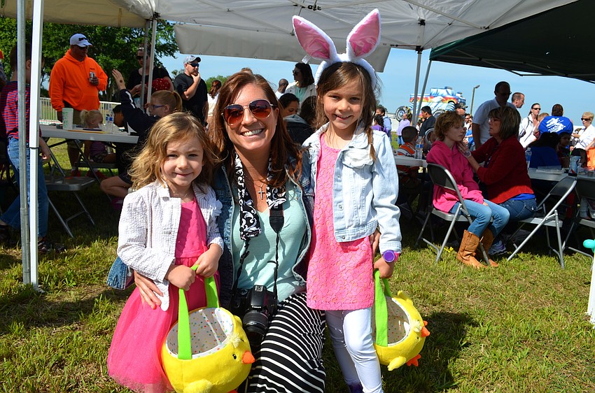 Ella Coppock tours the event with her mother, Adrienne, and sister, Zoe, before the hunt begins.