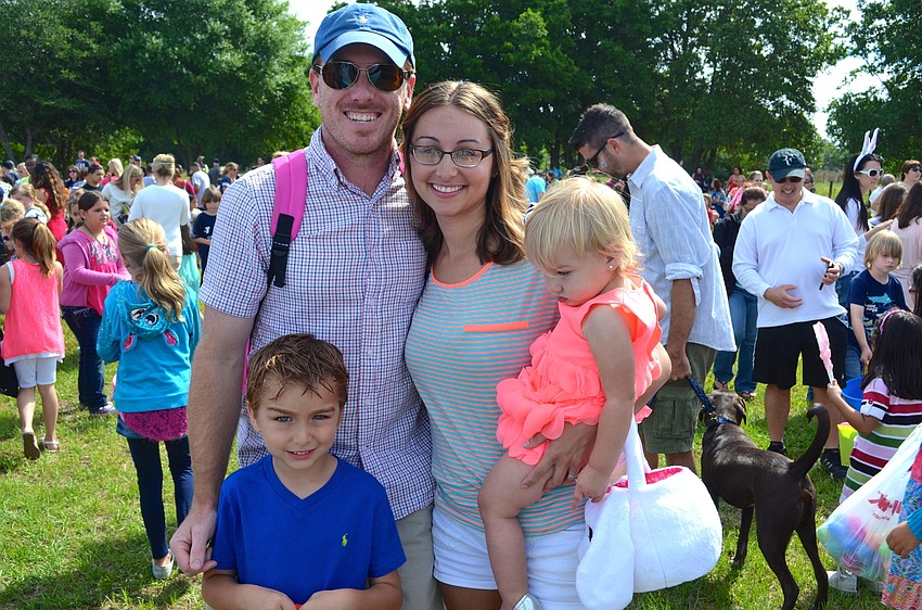 The McGill family — Colton, Chris, Brittany and Kinley — poses for its first family portrait.