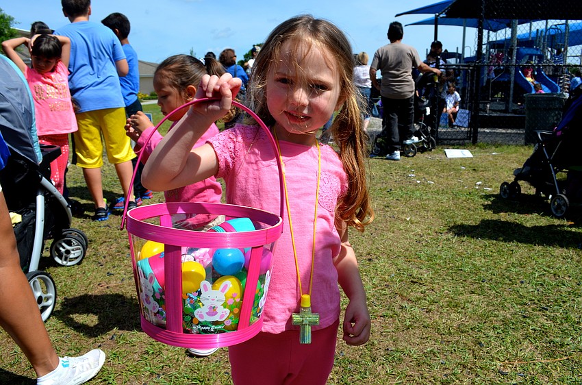 Four-year-old Zoey Kollet is pleased with the candy she collected.