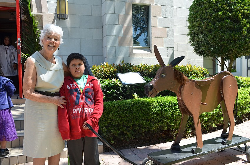 Molly Lambert and Diego Martinez with the donkey named Domingo Ramos.