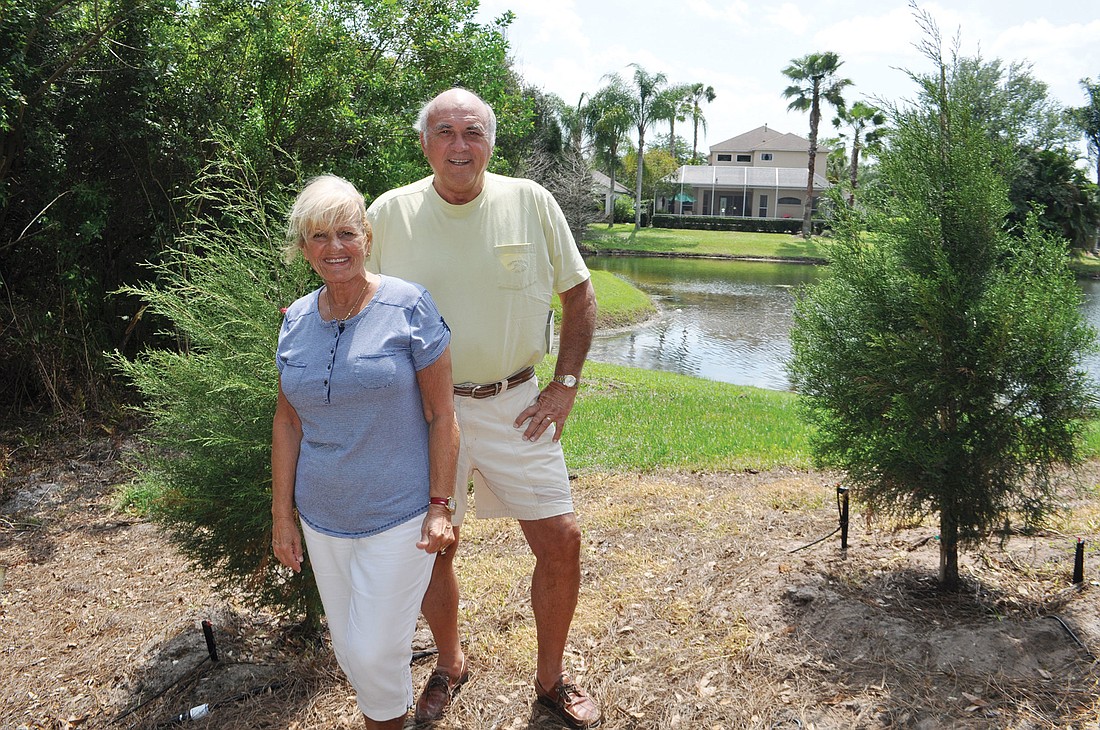 Carol and Art Brzostowski say the berm area immediately behind their house along State Road 70 has become more open since they moved in 10 years ago. The noise has increased, as has their view of the roadway.