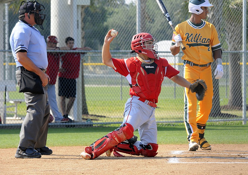 Cardinal Mooney catcher Parker Shanahan tosses the ball back to the mound in the top of the first inning.