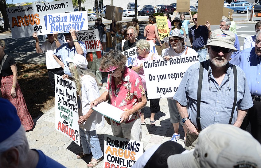 More than 80 representatives of community organizations and individuals gathered to rally for integrity.