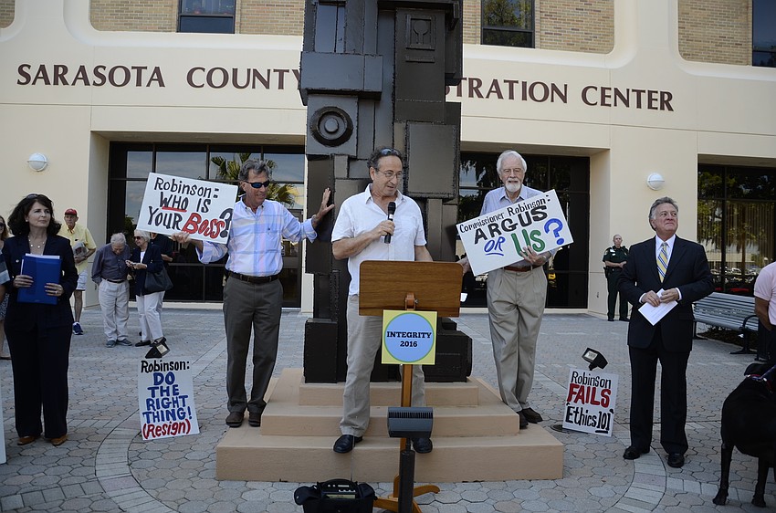 Andy Mele speaks to the 80-plus audience, backed by Cathy Antunes and Bill Zoller, left, and Wade Matthews and Dan Lobeck, right.