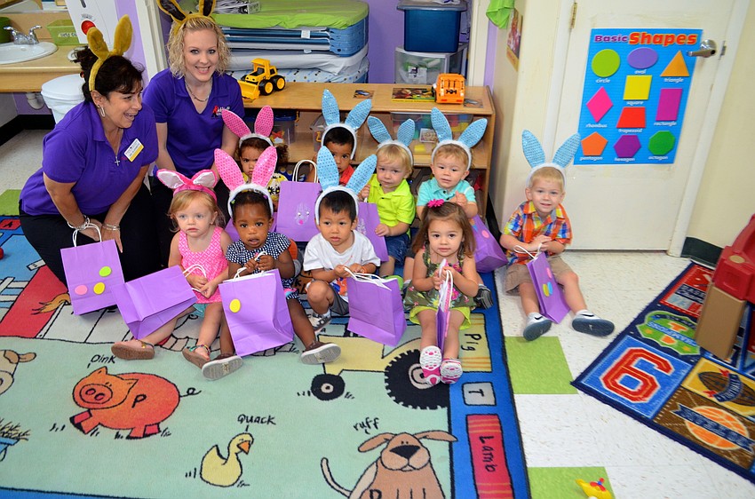 The 2-year-olds get ready to go on an egg hunt.
