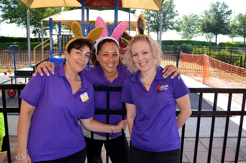Teachers Elizabeth Speranza, Jessie Hernandez and Jenna MacDonald show their holiday spirit.