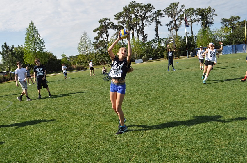 Elle LaClair, 13, proves an expert fireball player.