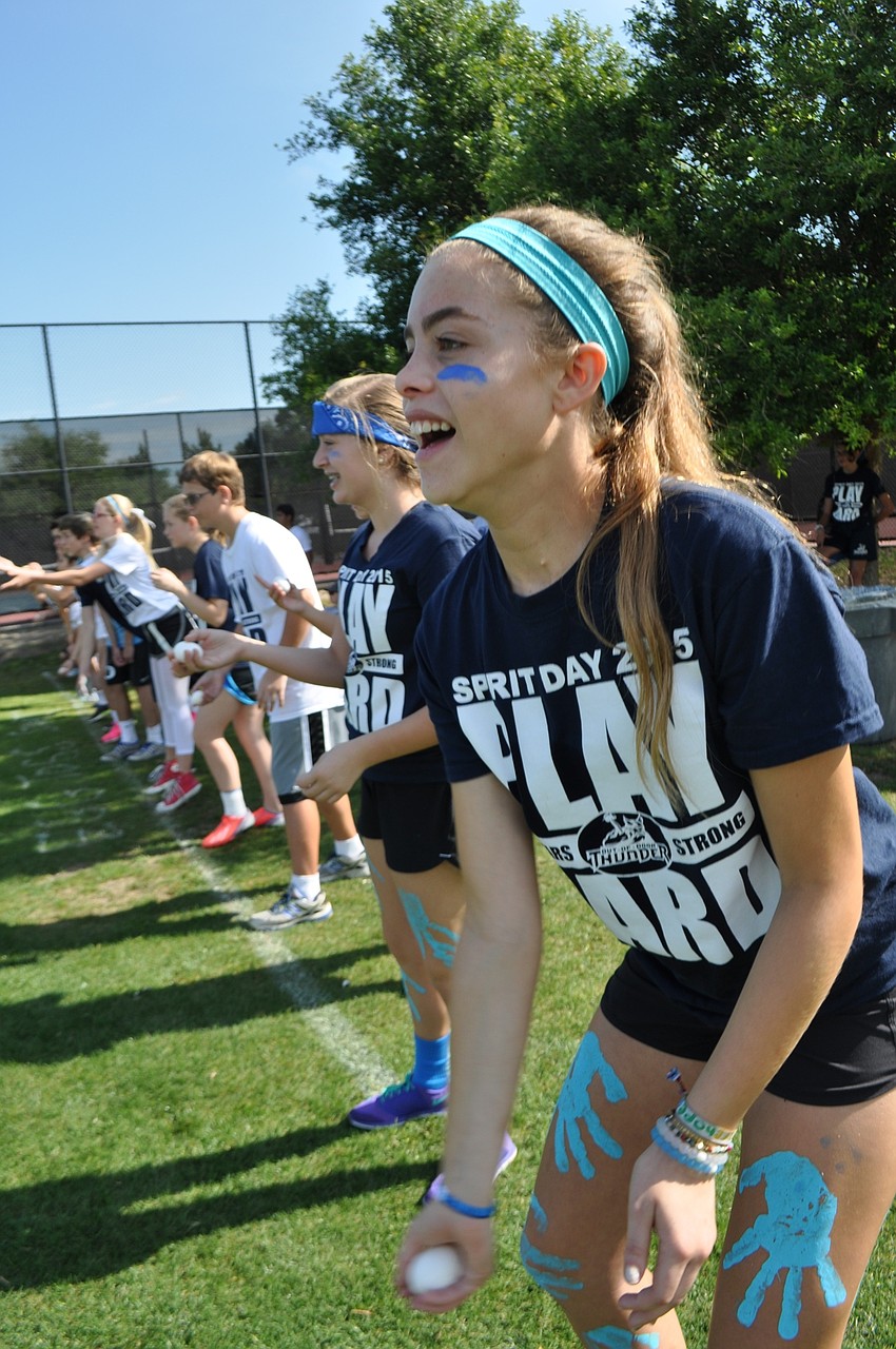 Madisyn Opstal, 13, attempts to gently toss an egg to her partner.