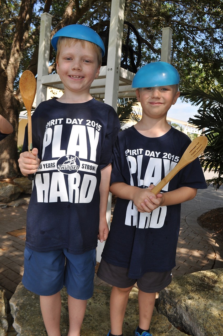 Erik and Hayne use game markers as hats.