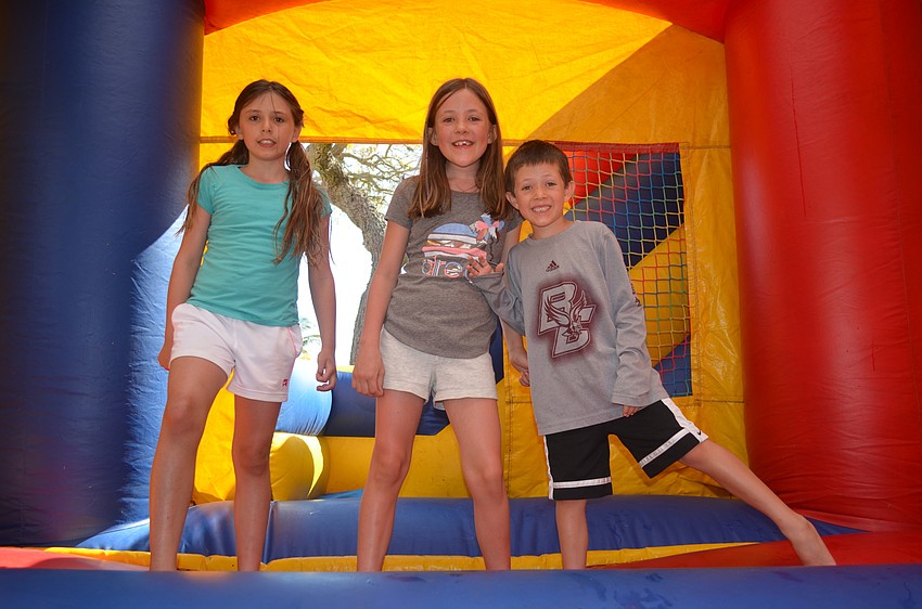 Mackenzie Bellows, 9, with Louisa, 8, and Charlie, 6, Russell