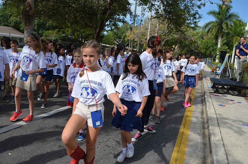 Students learning a line dancing routine for the North America section.