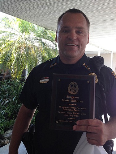 The Sheriff's Office presented Sergeant Scott Osborne with an award for his service at Thursday's Siesta Key Association meeting.