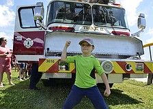 Steele Jackson, 8, said he was already pretty strong. His favorite thing at the Big Truck Day was the fire trucks. "They save lives sometimes," he said.