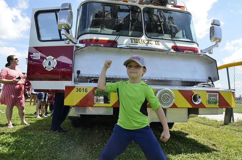 Steele Jackson, 8, said he was already pretty strong. His favorite thing at the Big Truck Day was the fire trucks. 