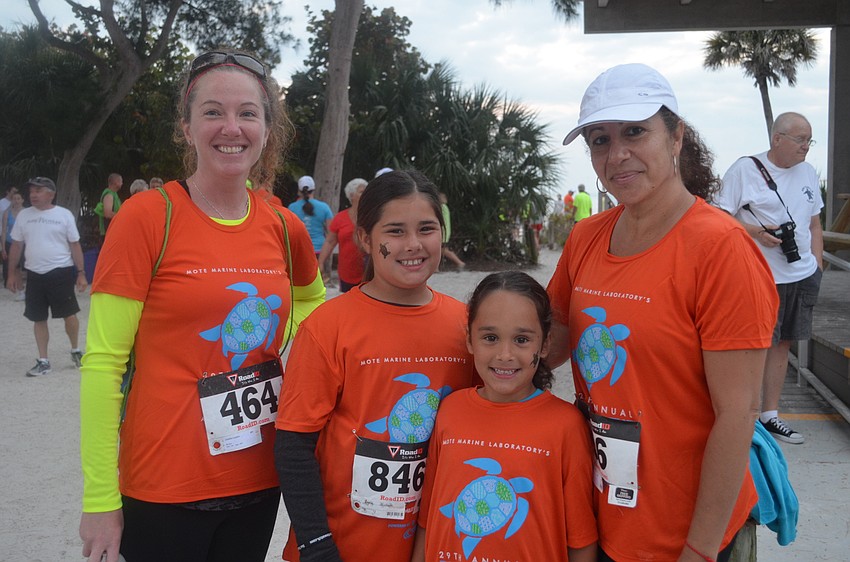 Amy Brumagin, Jarivette and Jamaris Ayala with Josefa Lozano before the race.