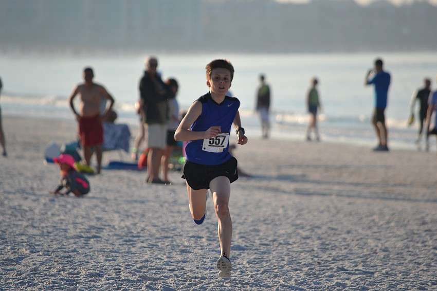 Overall winner 15-year-old Ben Olson just before completing the race.